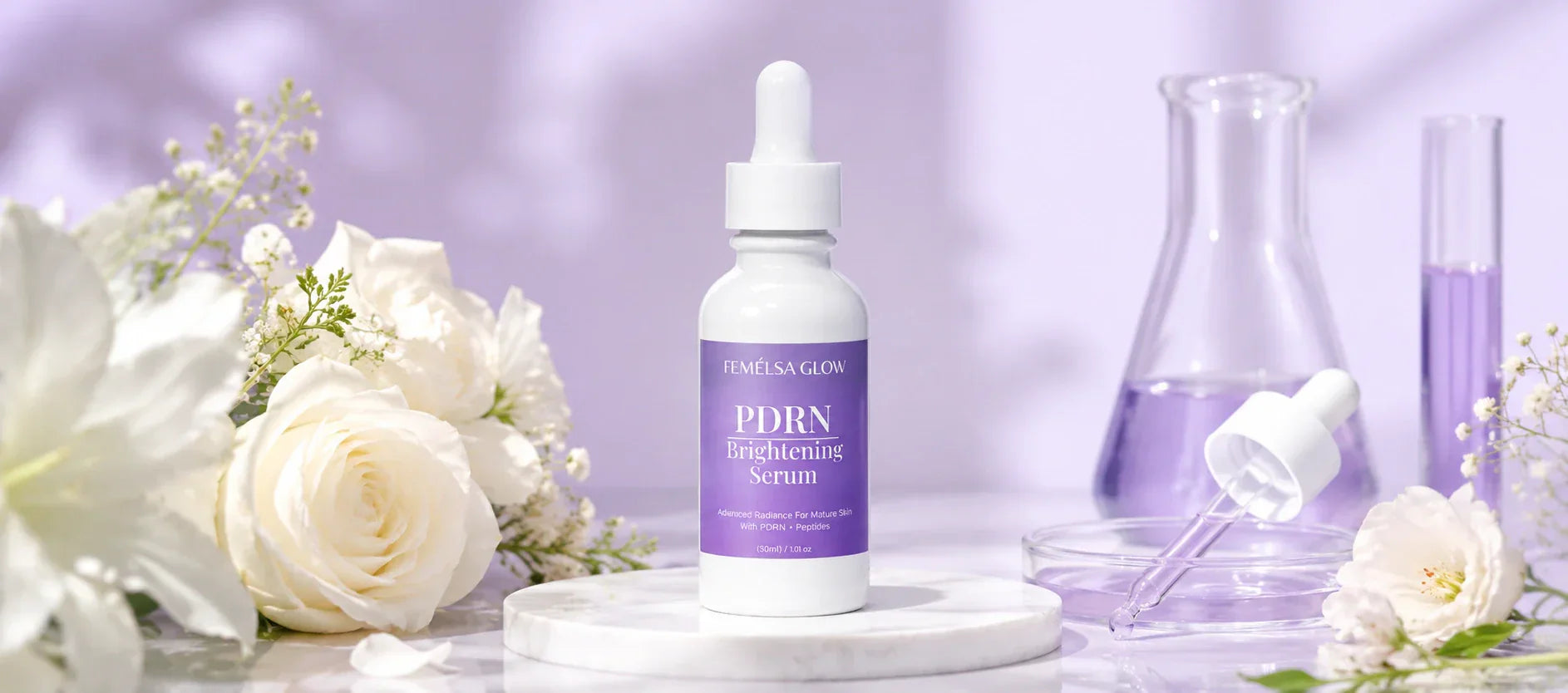 FEMELSA Glow skin brightening serum displayed on a marble surface with white flowers in a luxury skincare setting